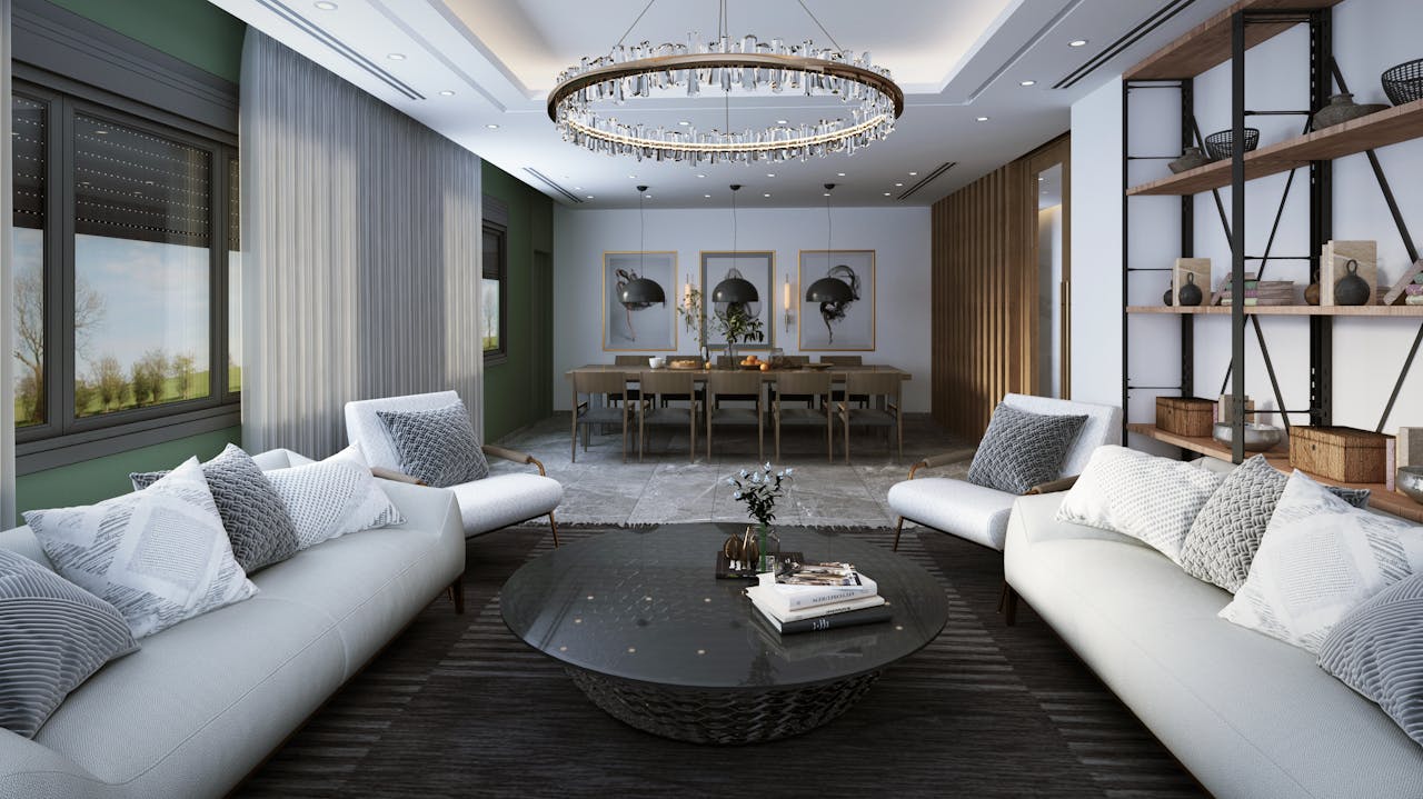 Stylish and luxurious living room featuring contemporary decor, elegant furniture, and a glass table.