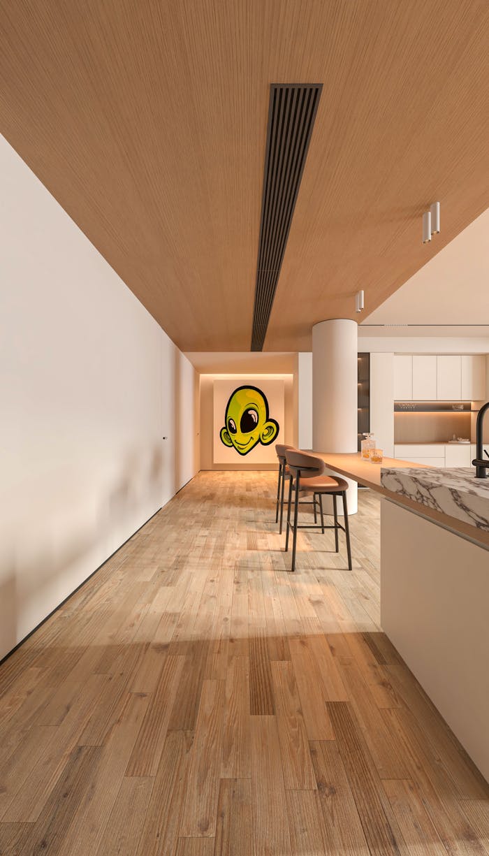 Spacious modern kitchen with unique alien-themed wall art